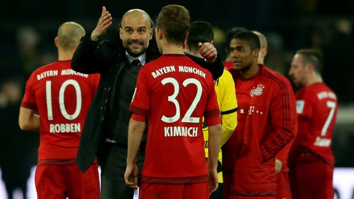 Pep Guardiola and Joshua Kimmich after a Bayern Munich vs. Dortmund match